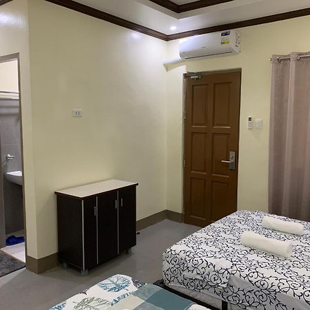 Zl Travelers Inn Batuan Exterior photo