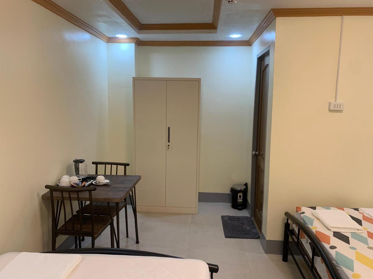 Zl Travelers Inn Batuan Exterior photo