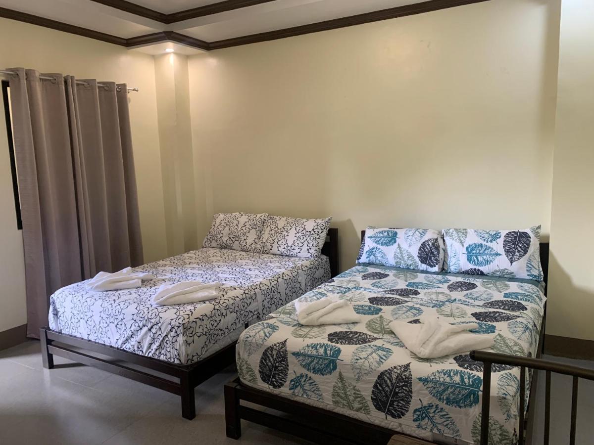 Zl Travelers Inn Batuan Exterior photo