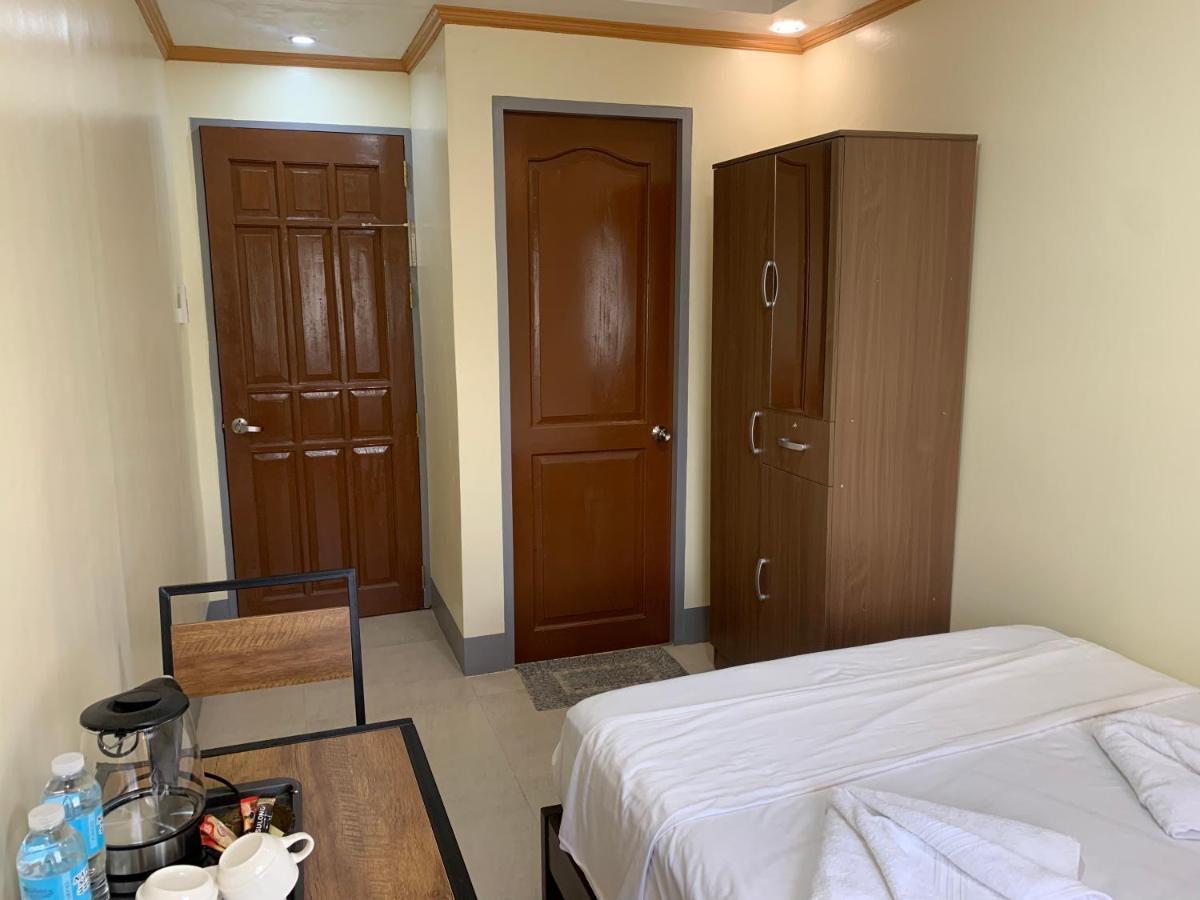 Zl Travelers Inn Batuan Exterior photo