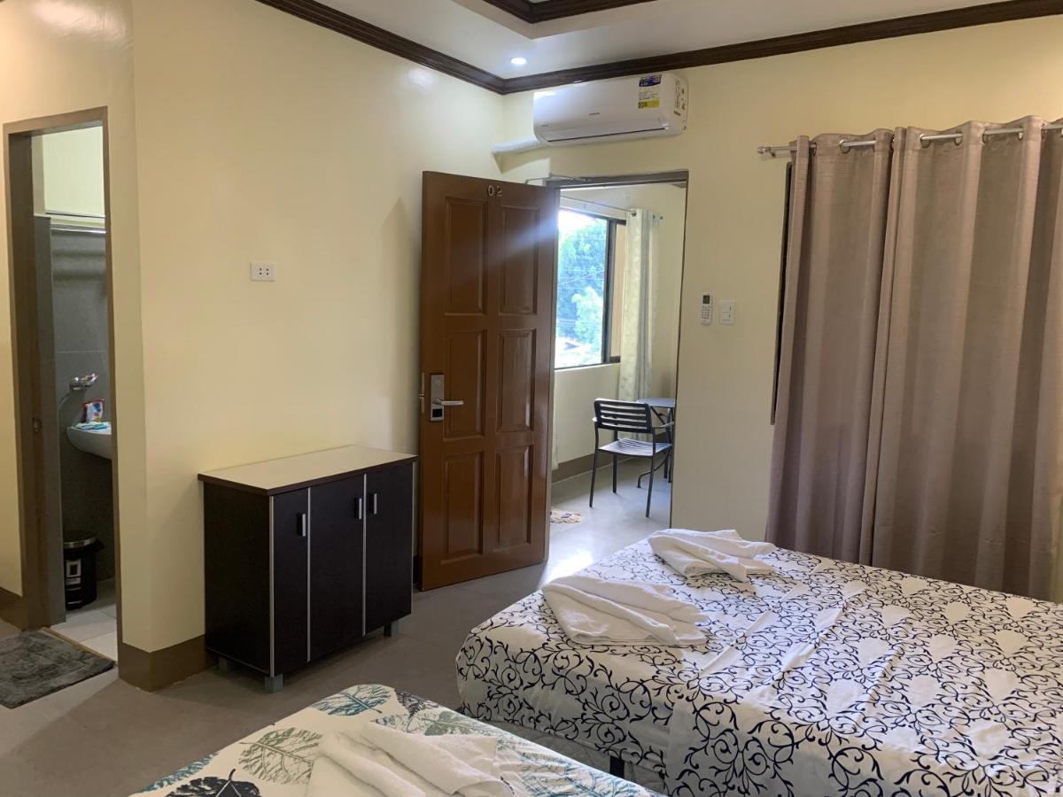 Zl Travelers Inn Batuan Exterior photo