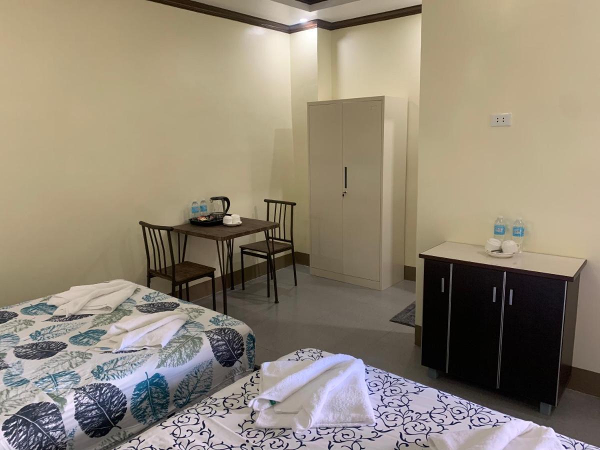 Zl Travelers Inn Batuan Exterior photo
