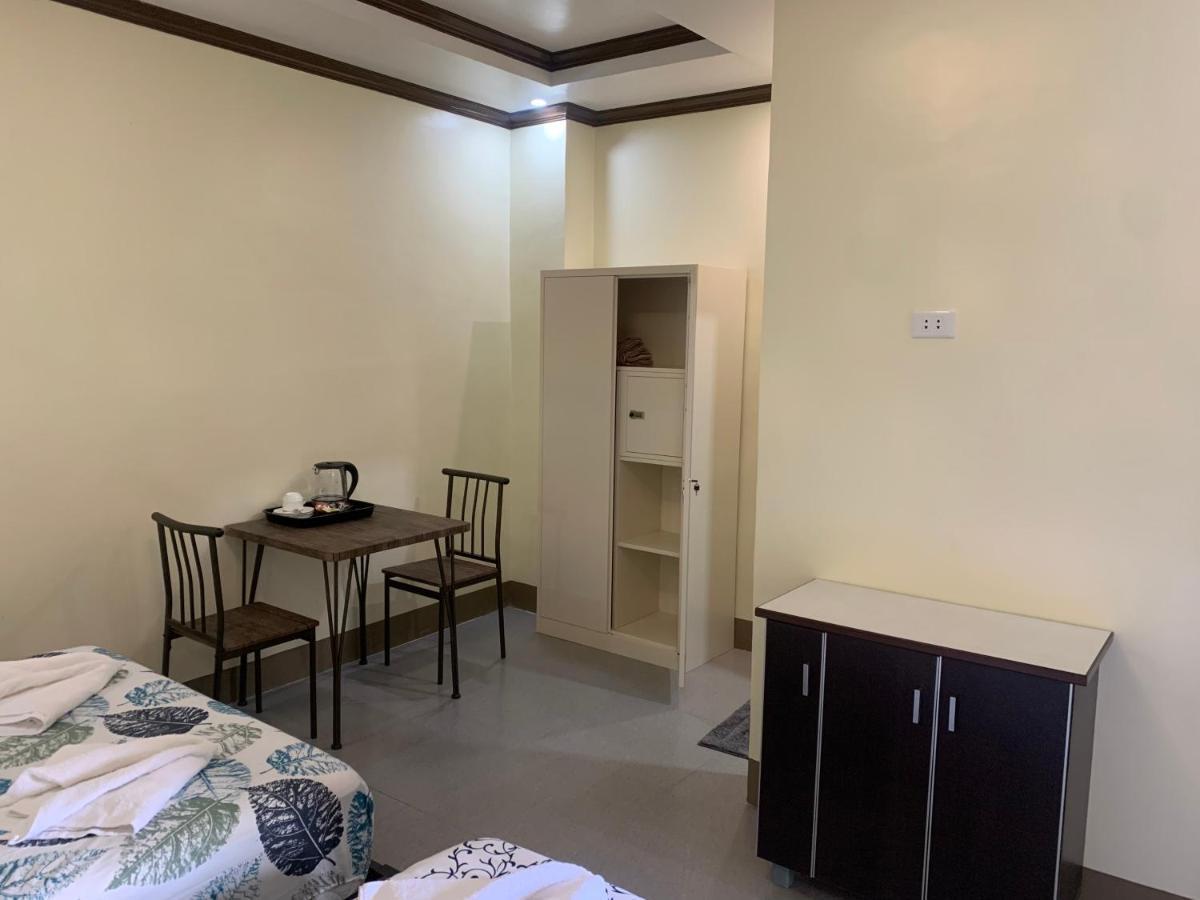 Zl Travelers Inn Batuan Exterior photo