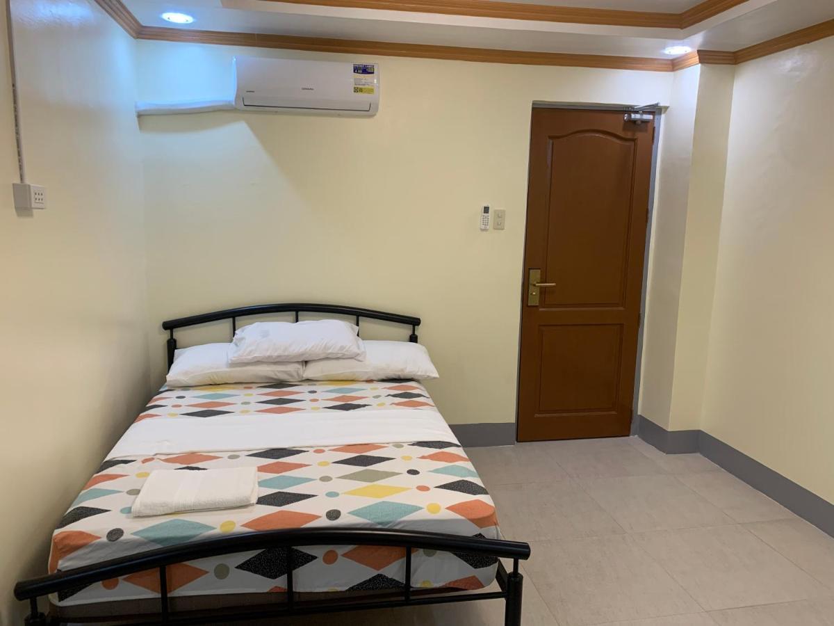 Zl Travelers Inn Batuan Exterior photo