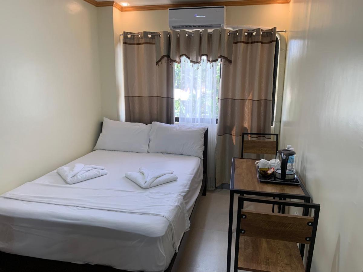 Zl Travelers Inn Batuan Exterior photo