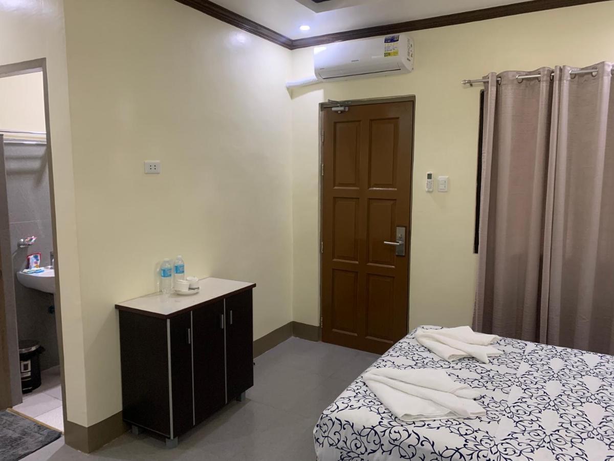 Zl Travelers Inn Batuan Exterior photo