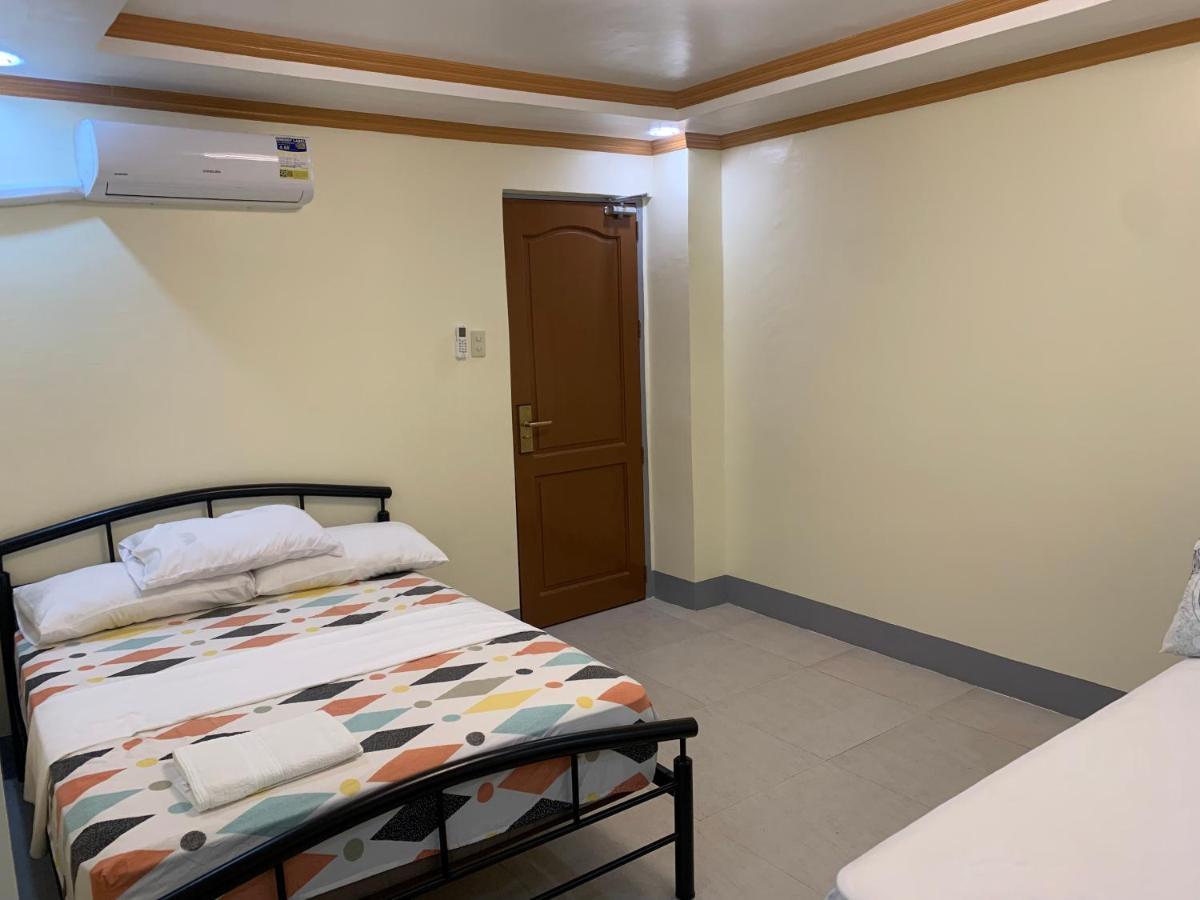 Zl Travelers Inn Batuan Exterior photo