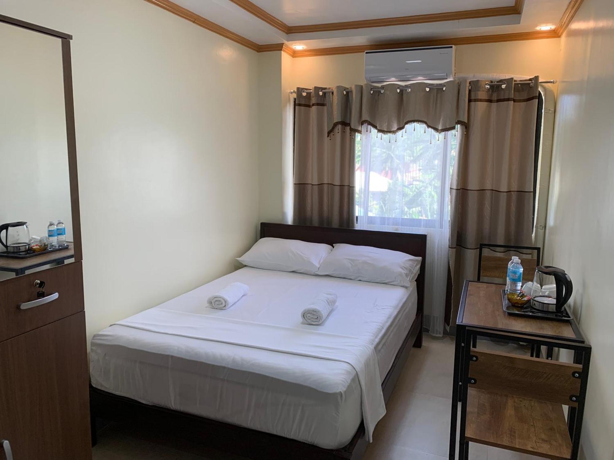 Zl Travelers Inn Batuan Exterior photo