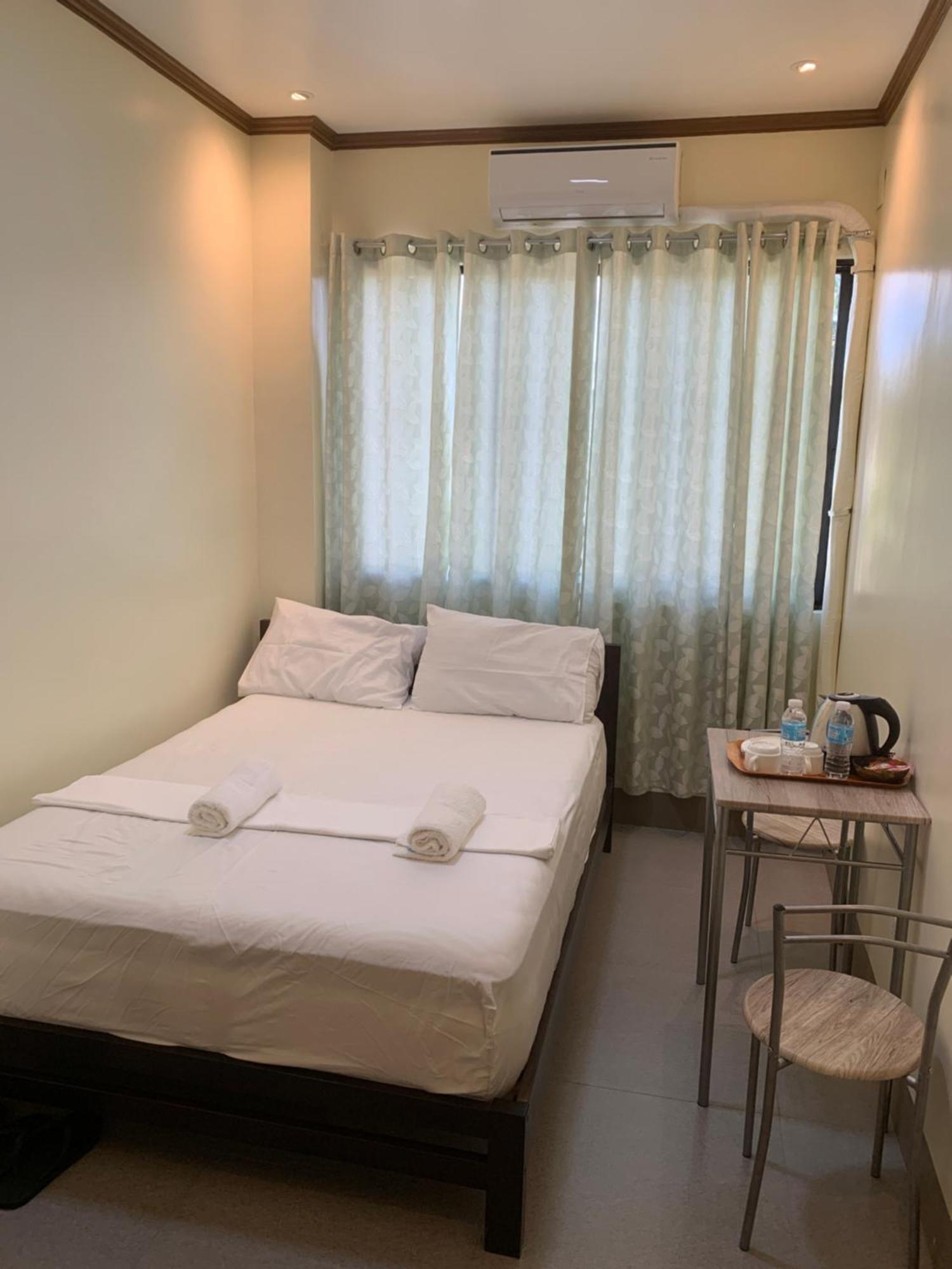 Zl Travelers Inn Batuan Exterior photo