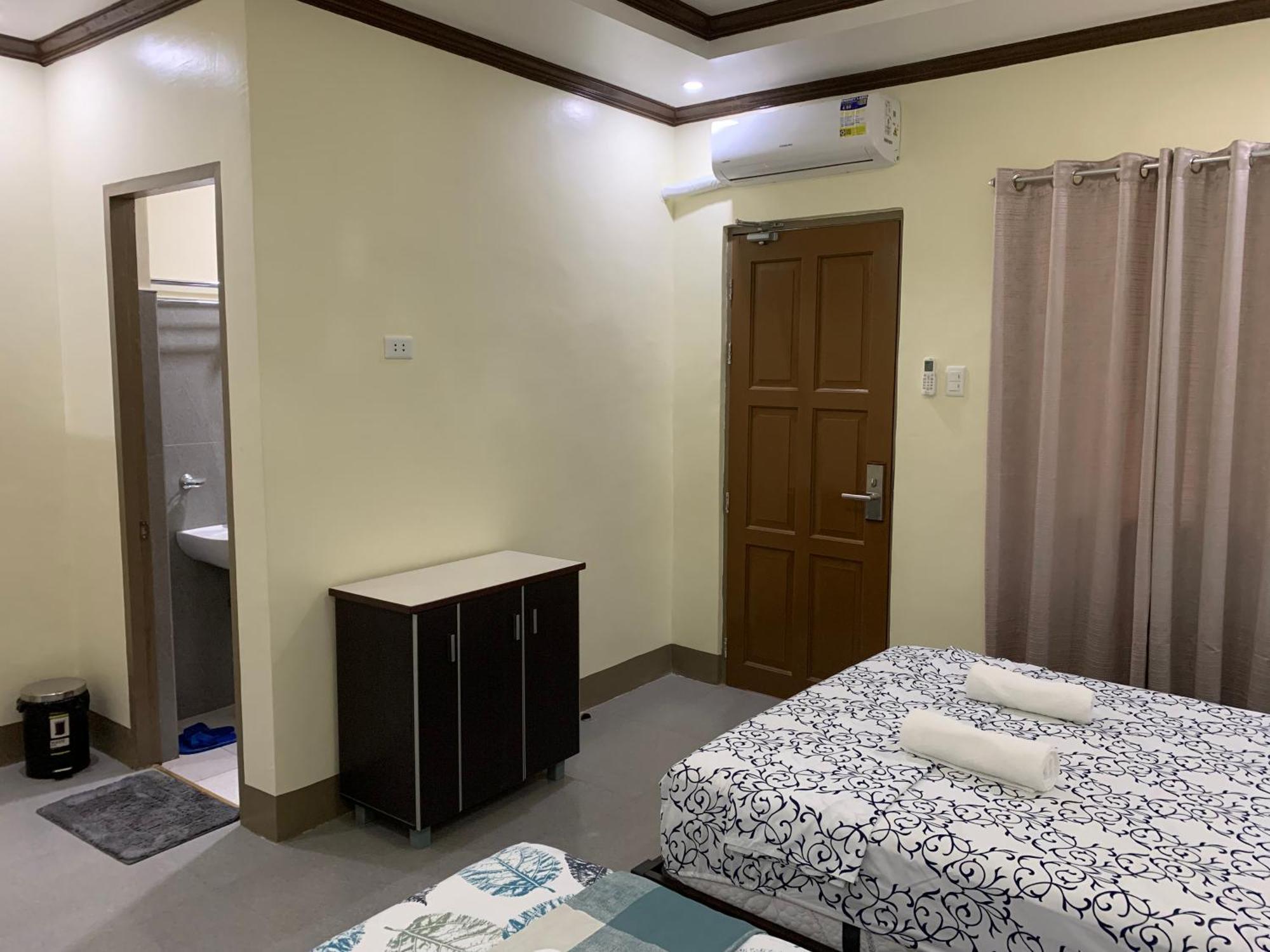 Zl Travelers Inn Batuan Exterior photo