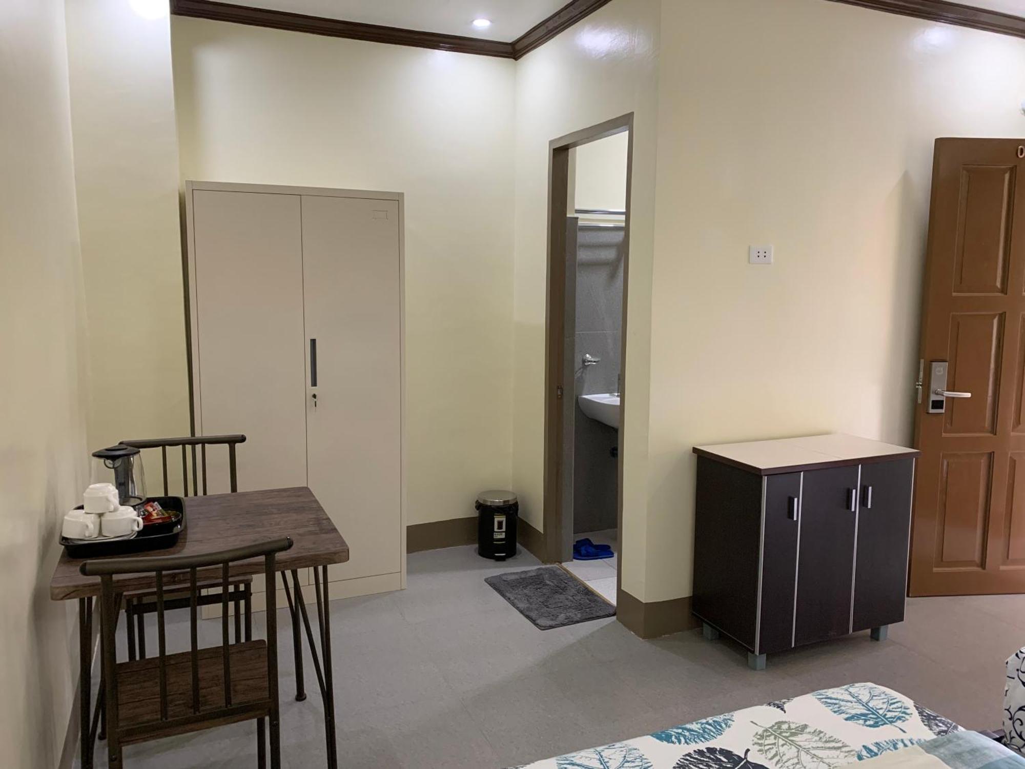 Zl Travelers Inn Batuan Exterior photo