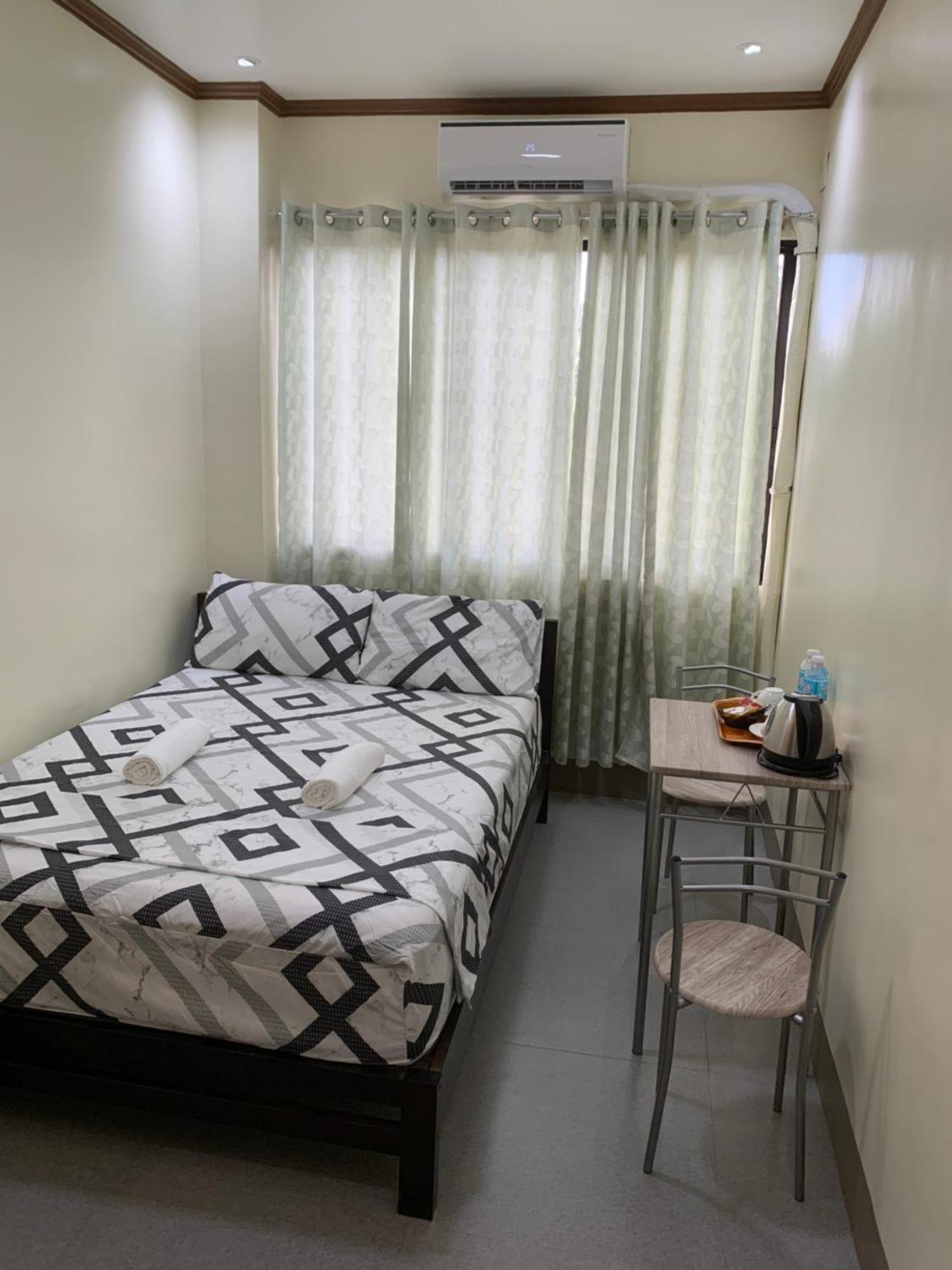 Zl Travelers Inn Batuan Exterior photo