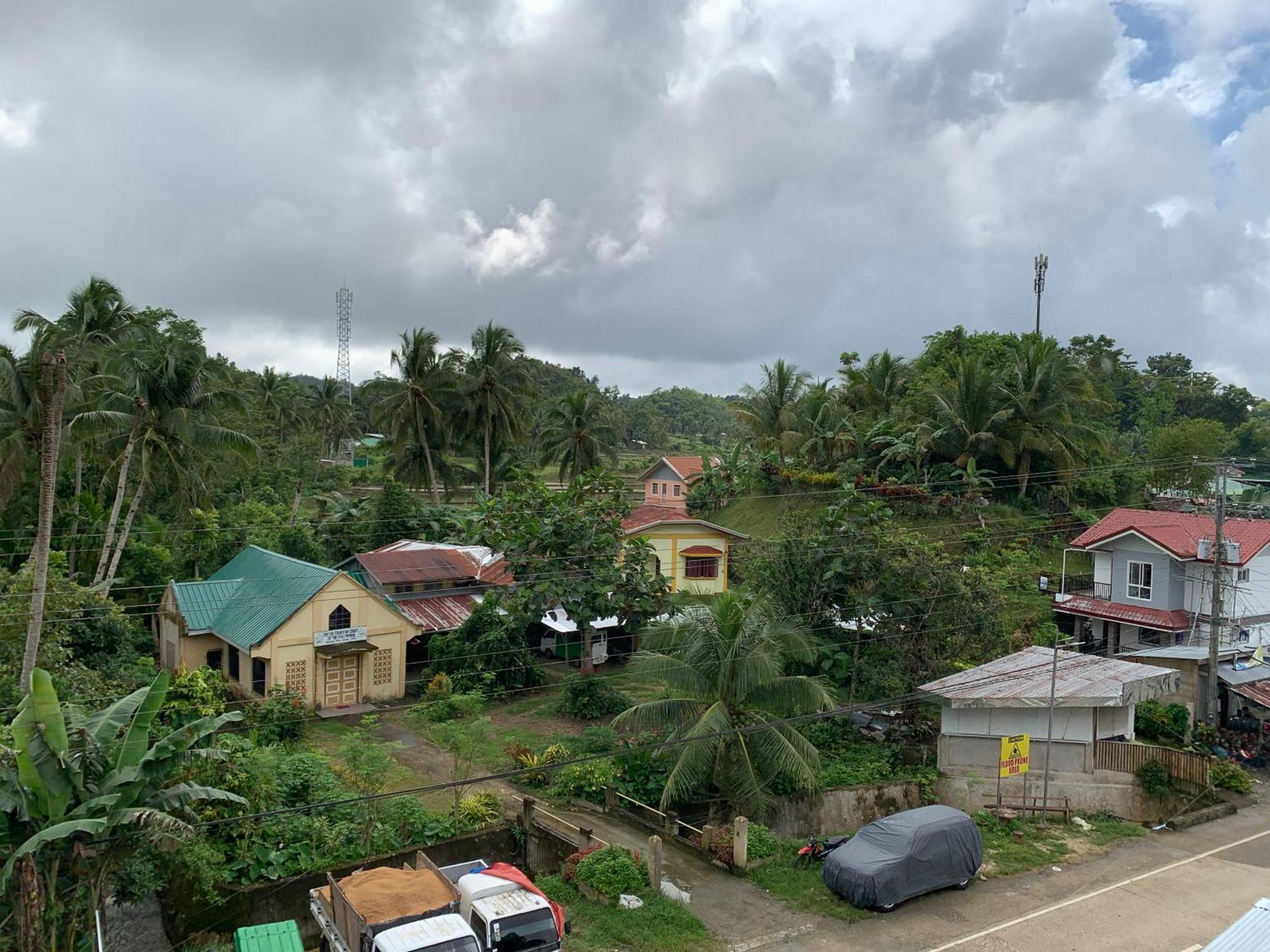 Zl Travelers Inn Batuan Exterior photo