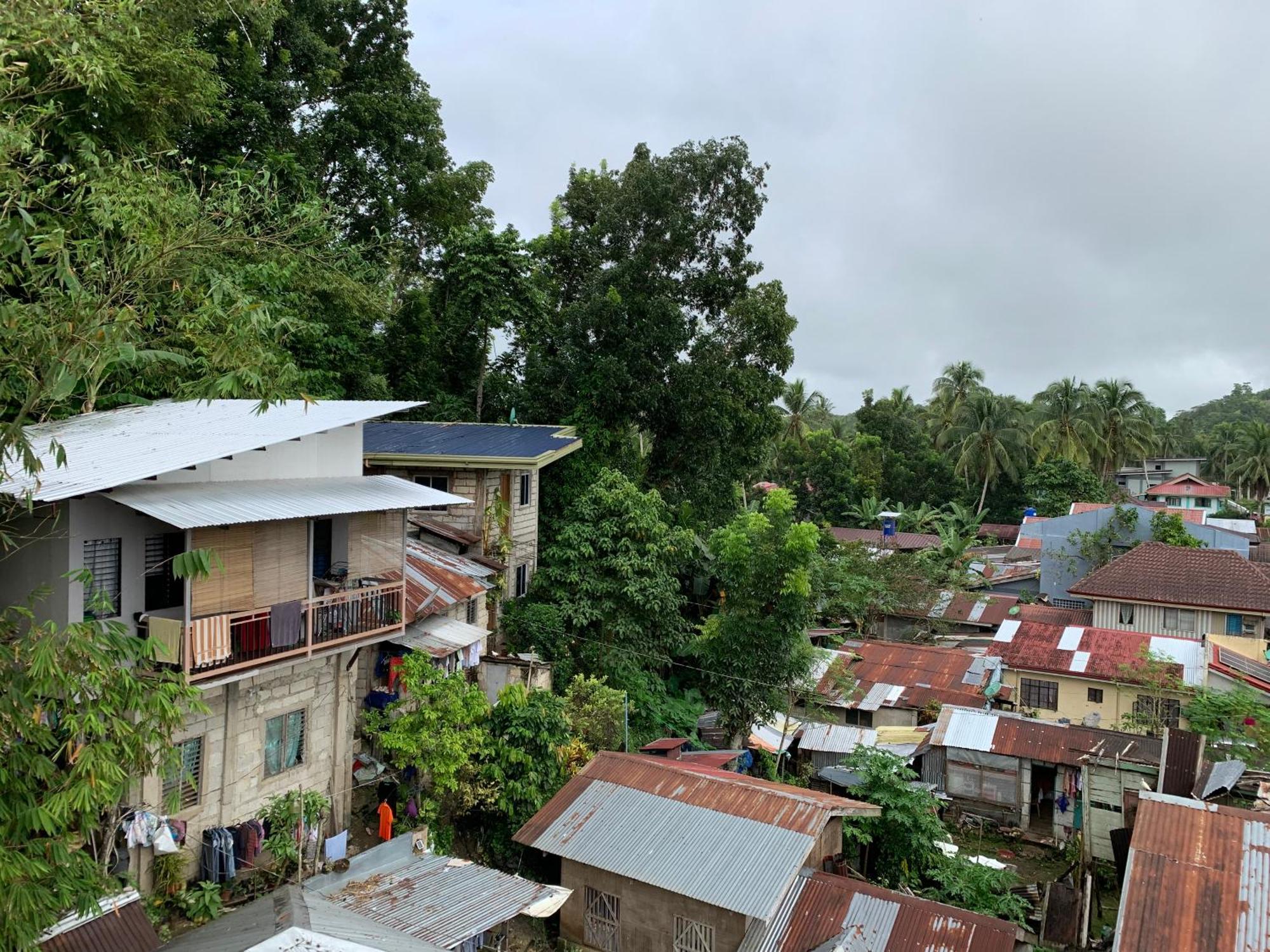Zl Travelers Inn Batuan Exterior photo