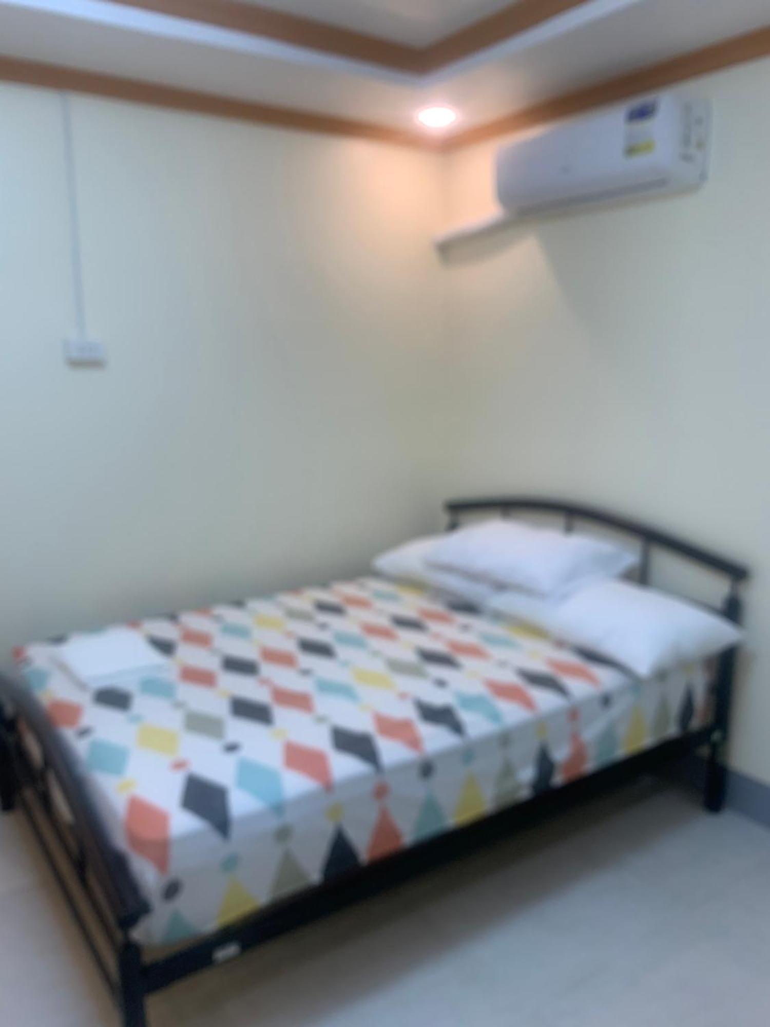 Zl Travelers Inn Batuan Exterior photo