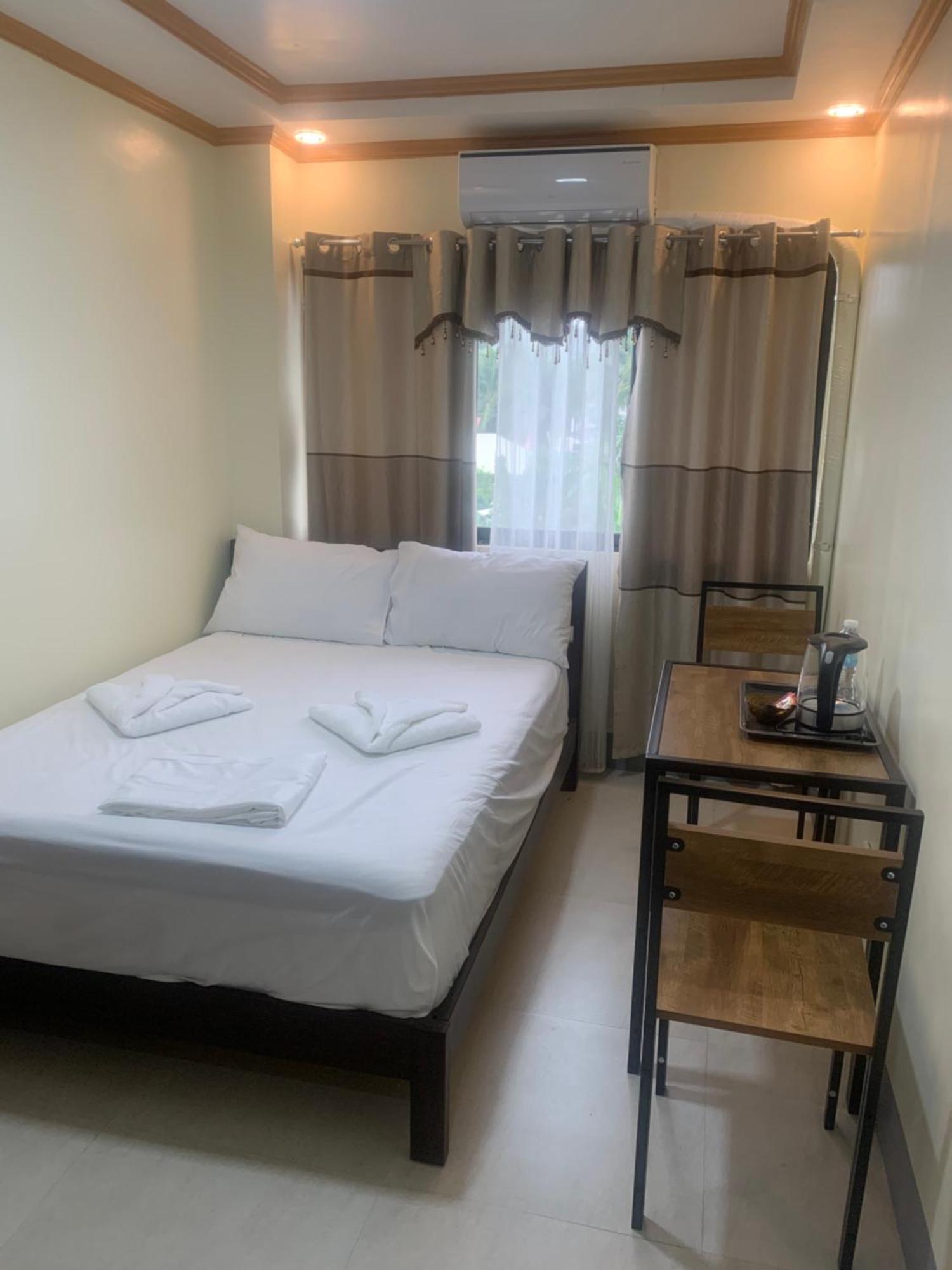 Zl Travelers Inn Batuan Exterior photo