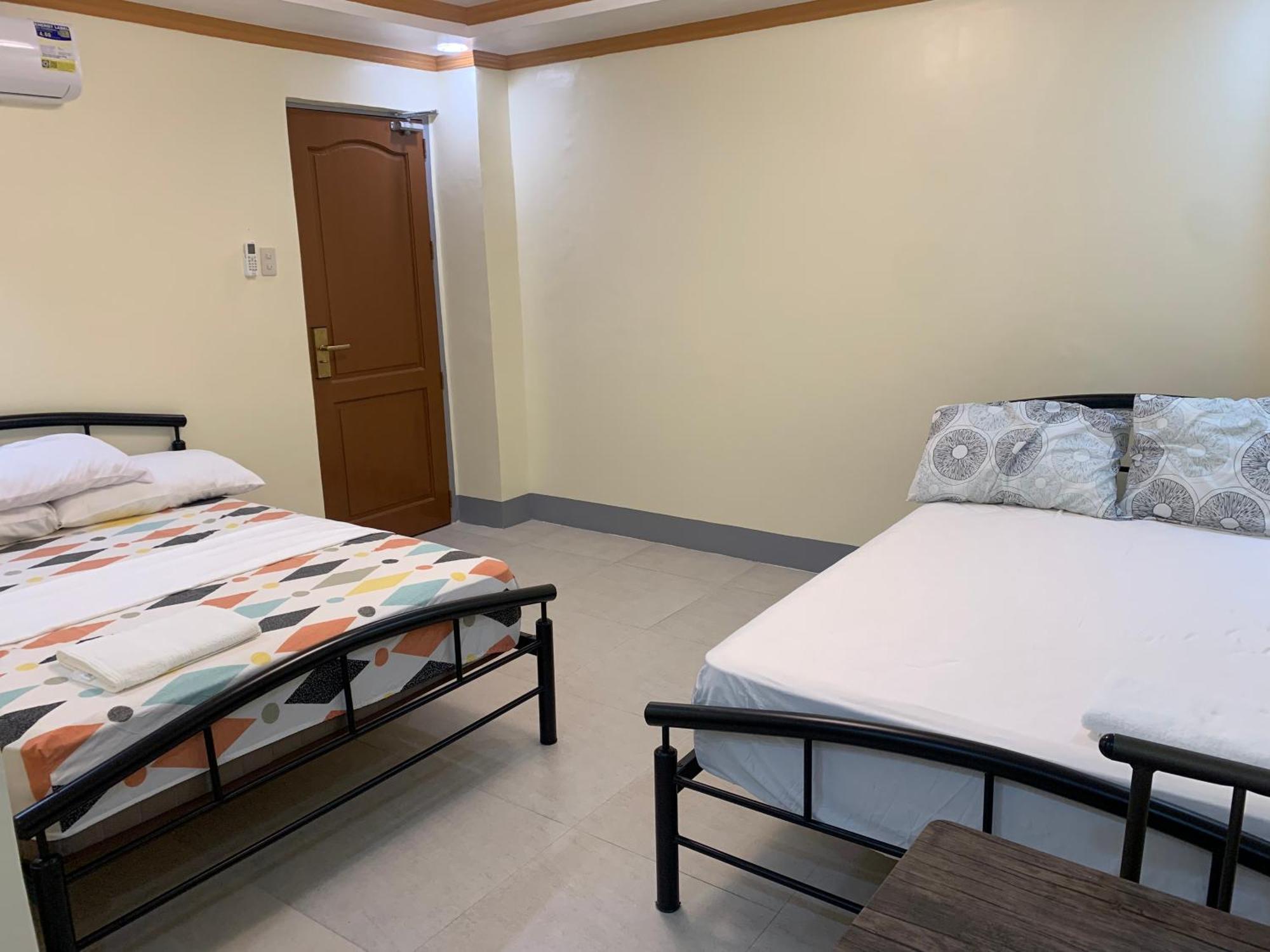 Zl Travelers Inn Batuan Exterior photo